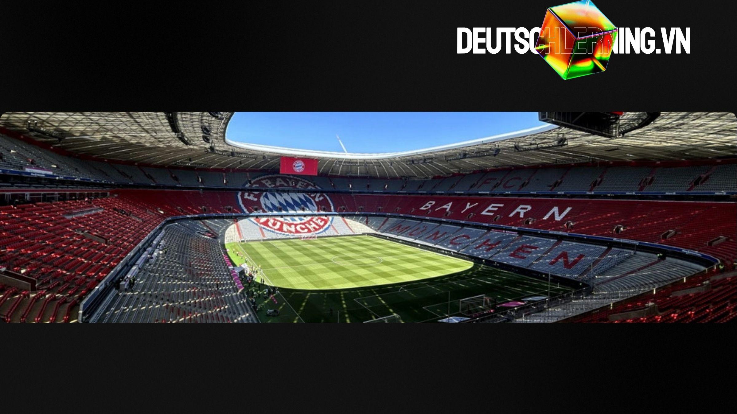 Sân vận động bóng đá tại Đức với ánh đèn rực rỡ trước trận đấu.